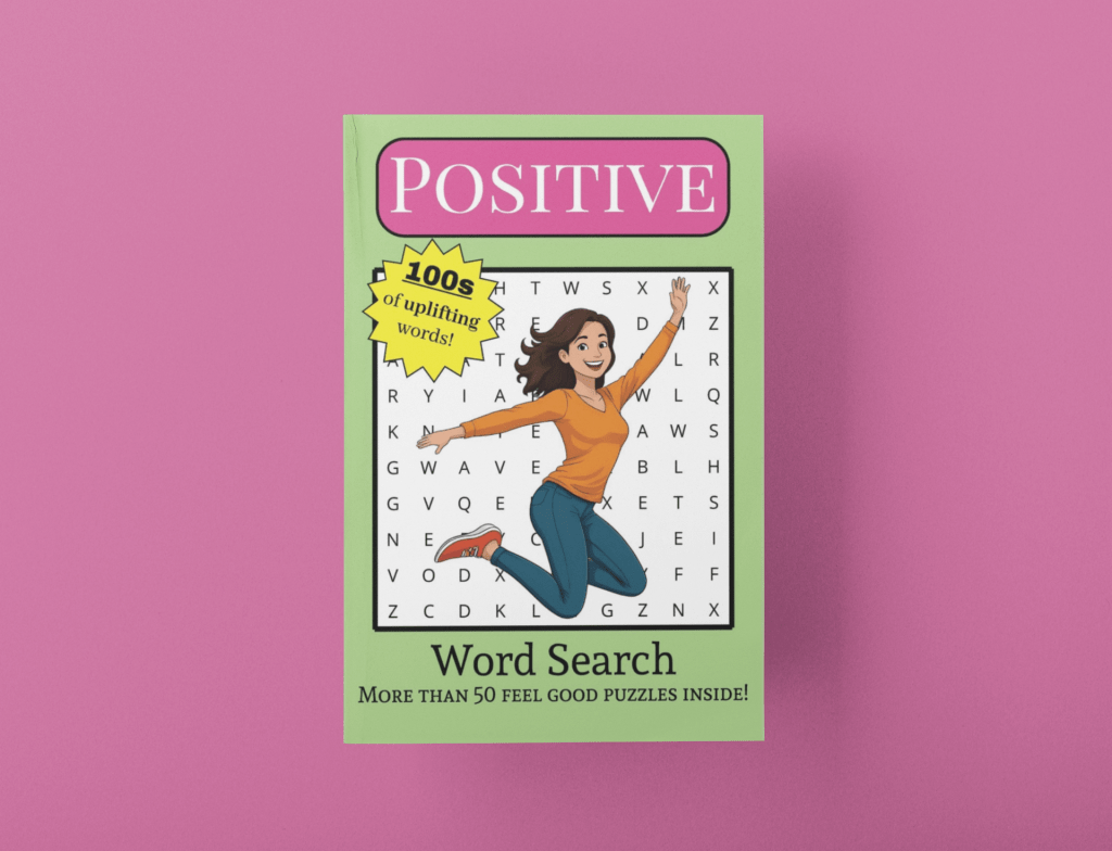 A Positive Word Search Book on top of a pink background. The book has a cartoon image of a woman jumping in the air, with a smile on her face. She's superimposed on a word search.