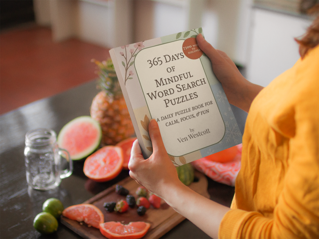 A woman holds the book 365 Days of Mindful Word Search Puzzles.